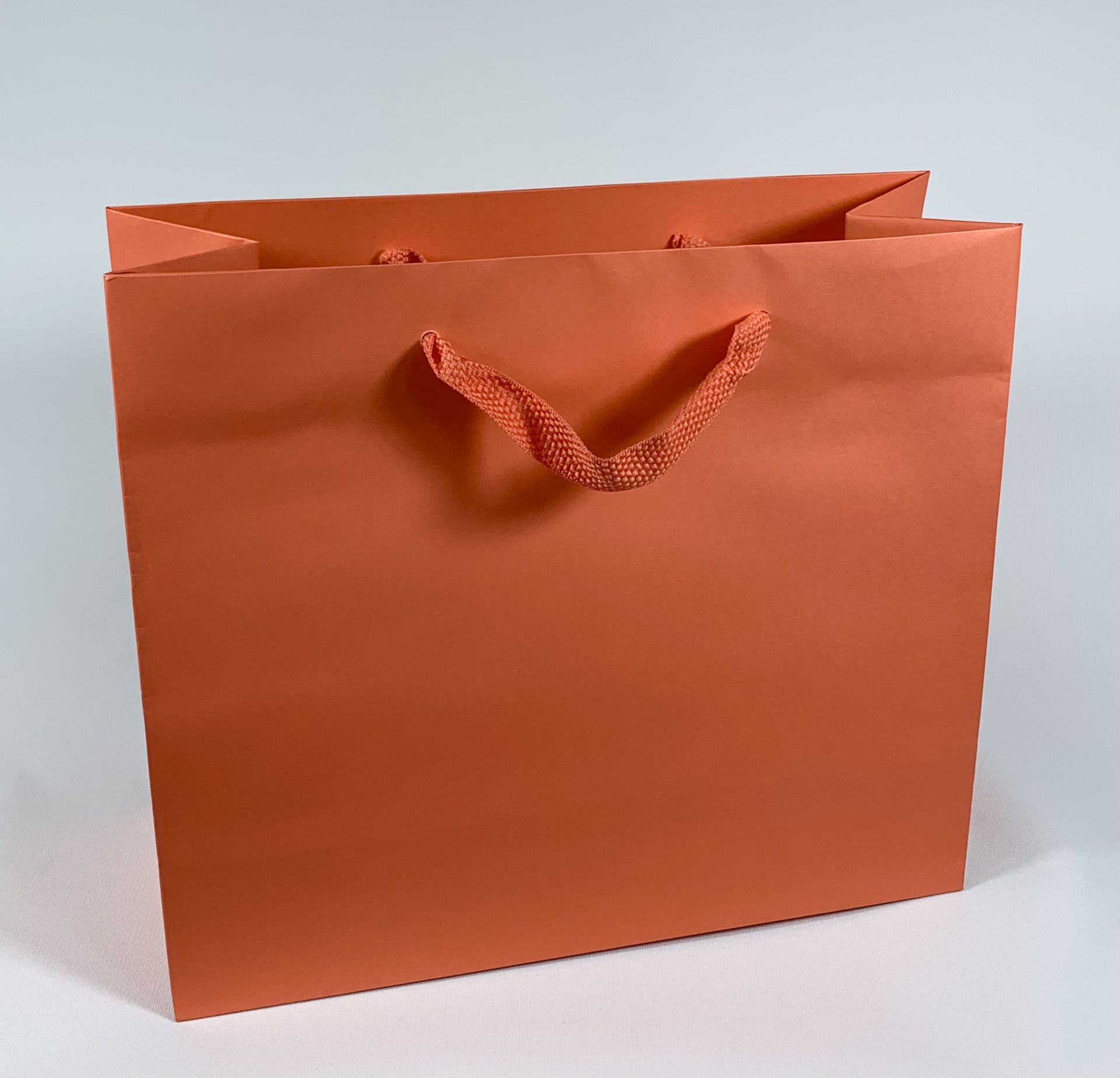 Papiertragetasche Koralle mit Baumwollband